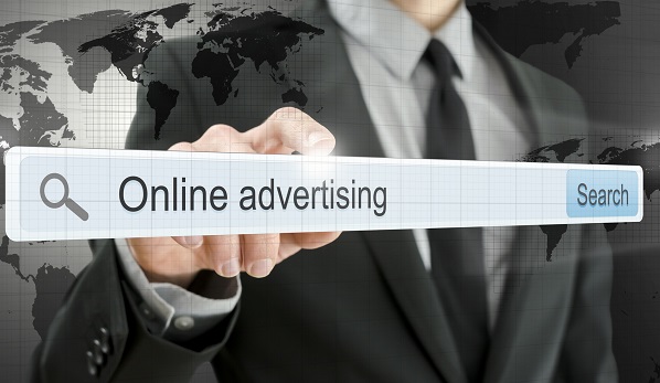Online advertising written in search bar on virtual screen.